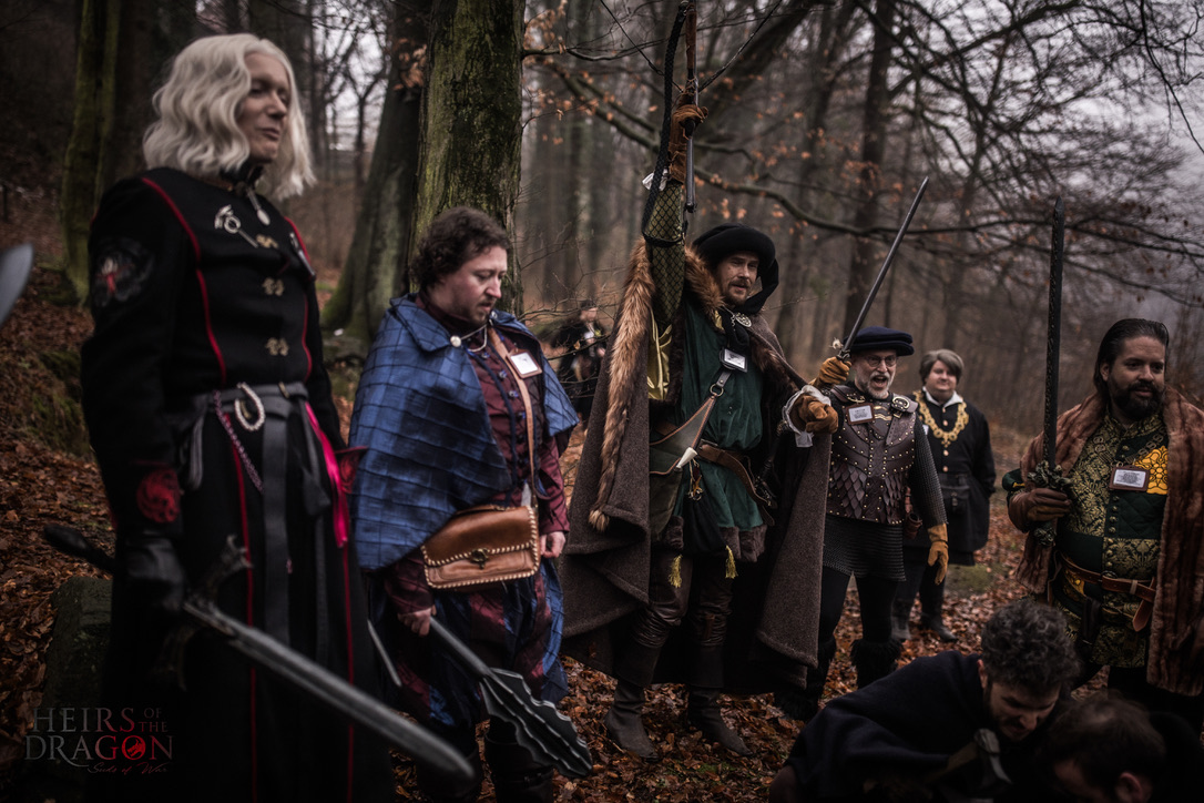 Lord Tully, Walter Tully, Daemon Targaryen, and others at the bear hunt